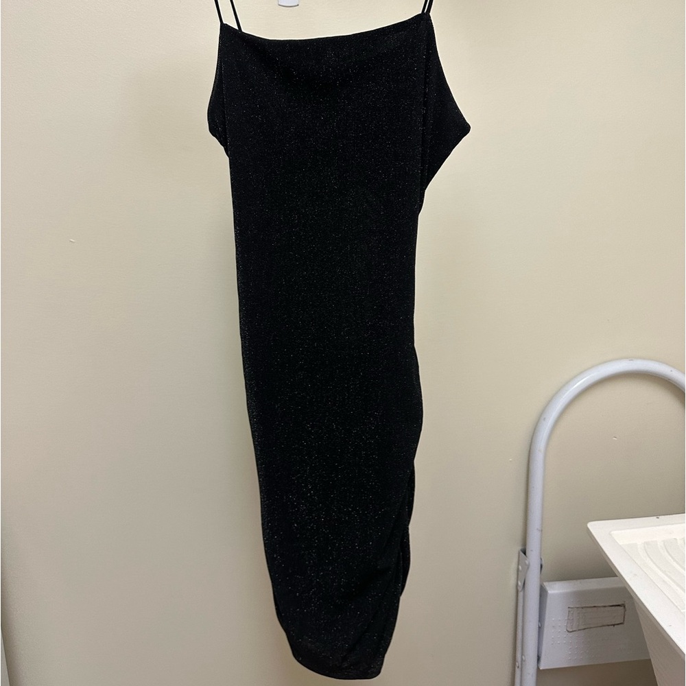 Women’s black sparkly cocktail dress.